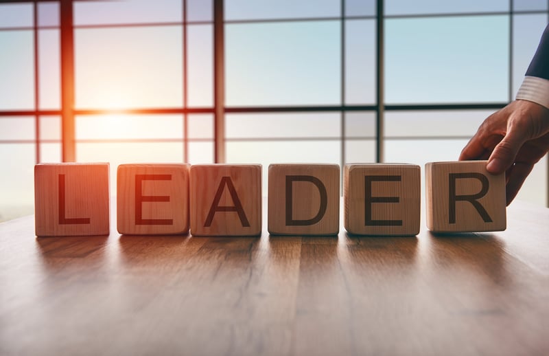 Blocks that spell "LEADERSHIP" in a bright window