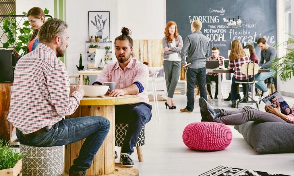 Marketing agency workers having coffee break at comfortable relax zone