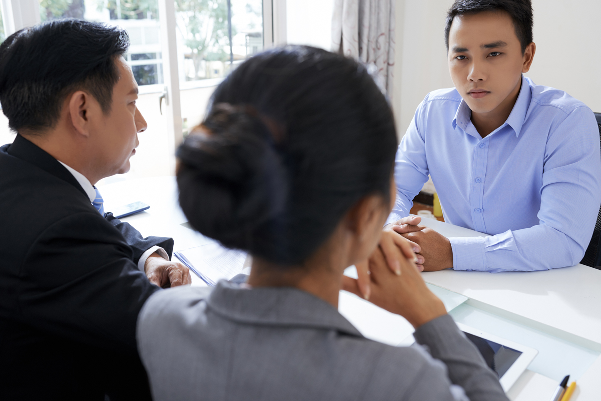 Stock photo of termination meeting