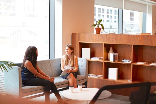 Young woman hiring manager interviewing a potential long-term employee